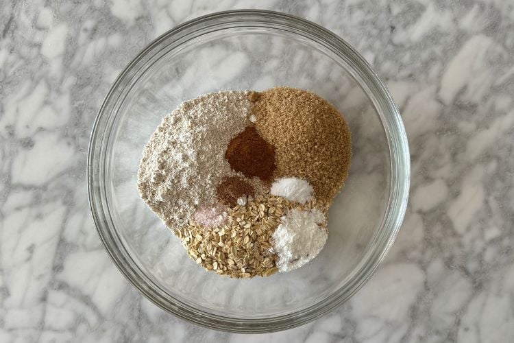 Apple oat muffin dry ingredients in bowl