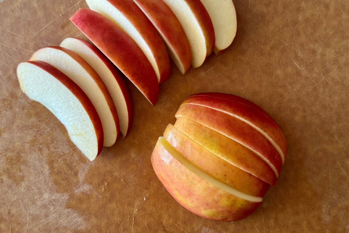Apple slices on a cutting board