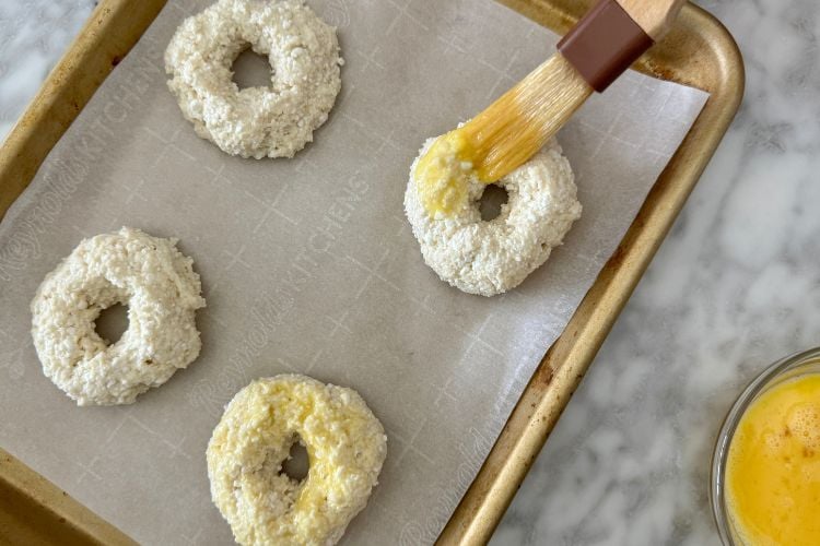 Bagels brushed with egg wash