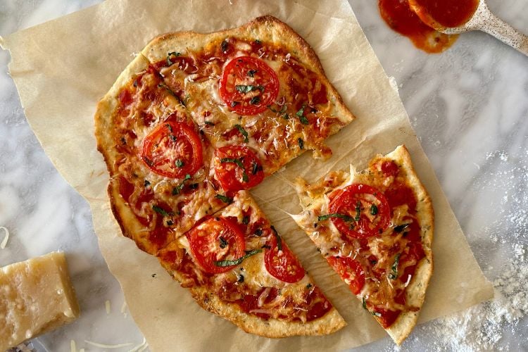 Baked and sliced pizza