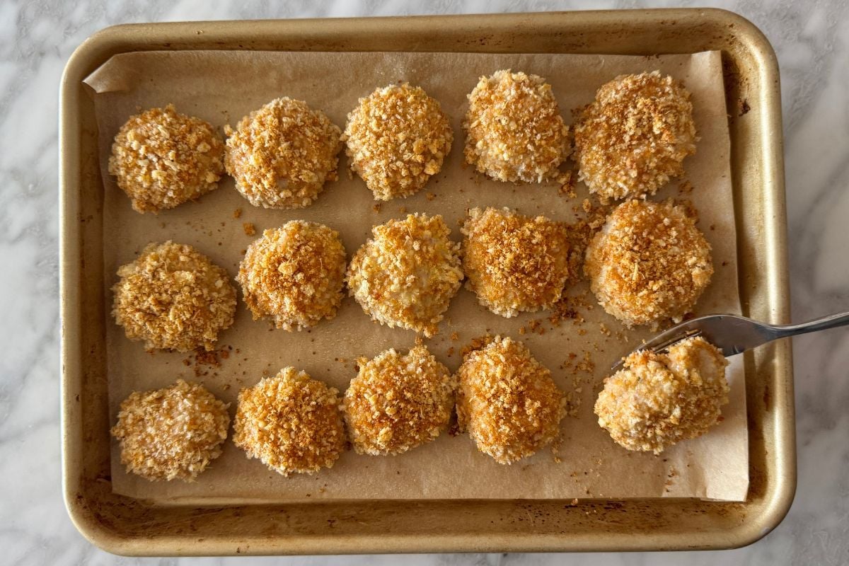 Baked chicken nuggets flipped halfway through