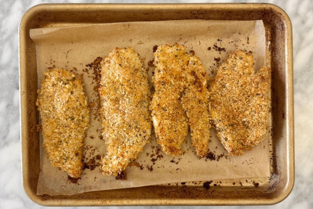 Baked chicken parmesan on a sheet pan