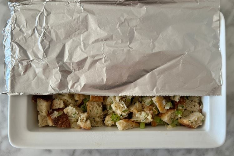 Baking dish with stuffing covered with foil