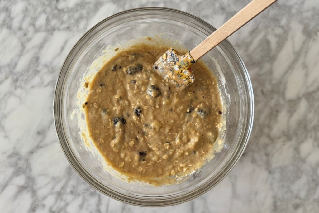 Banana blackberry muffins folded into the batter