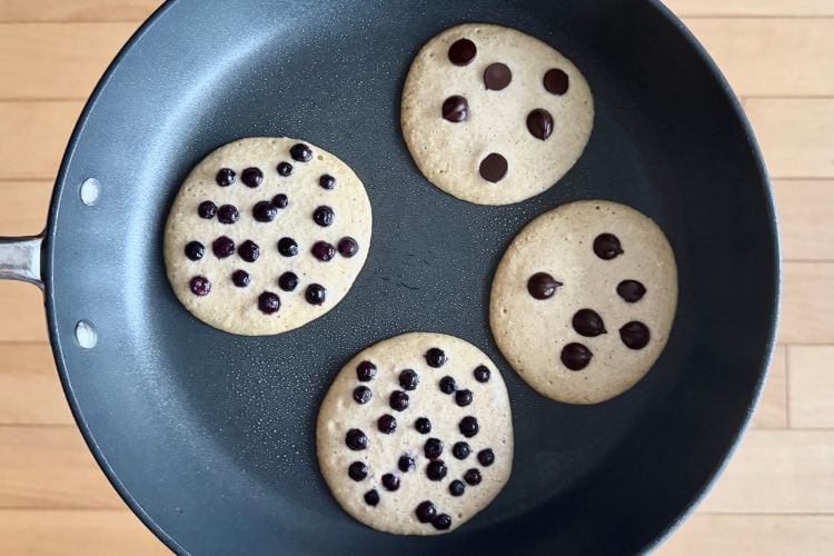 Banana cottage cheese pancakes with blueberries and chocolate chips