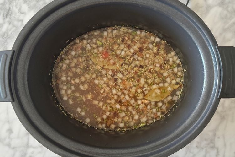 Beef broth in slow cooker for charro beans