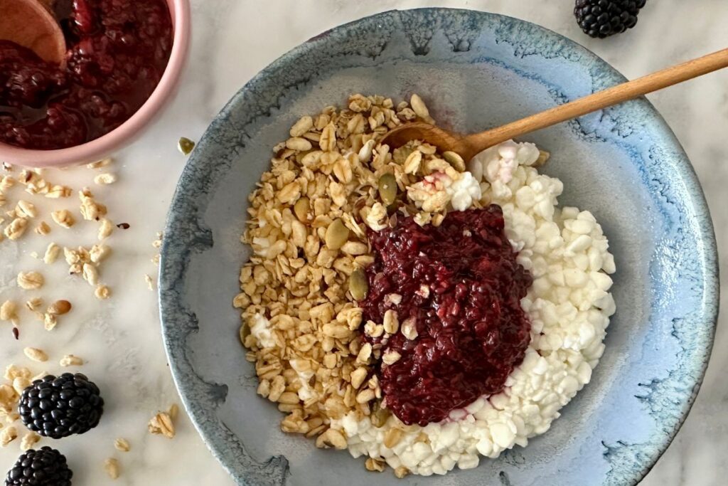 Blackberry compote served with cottage cheese