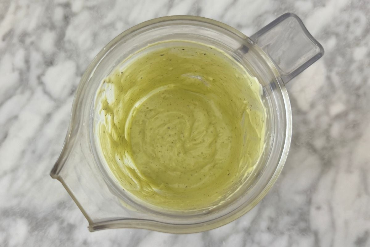 Blended avocado yogurt dressing in blender