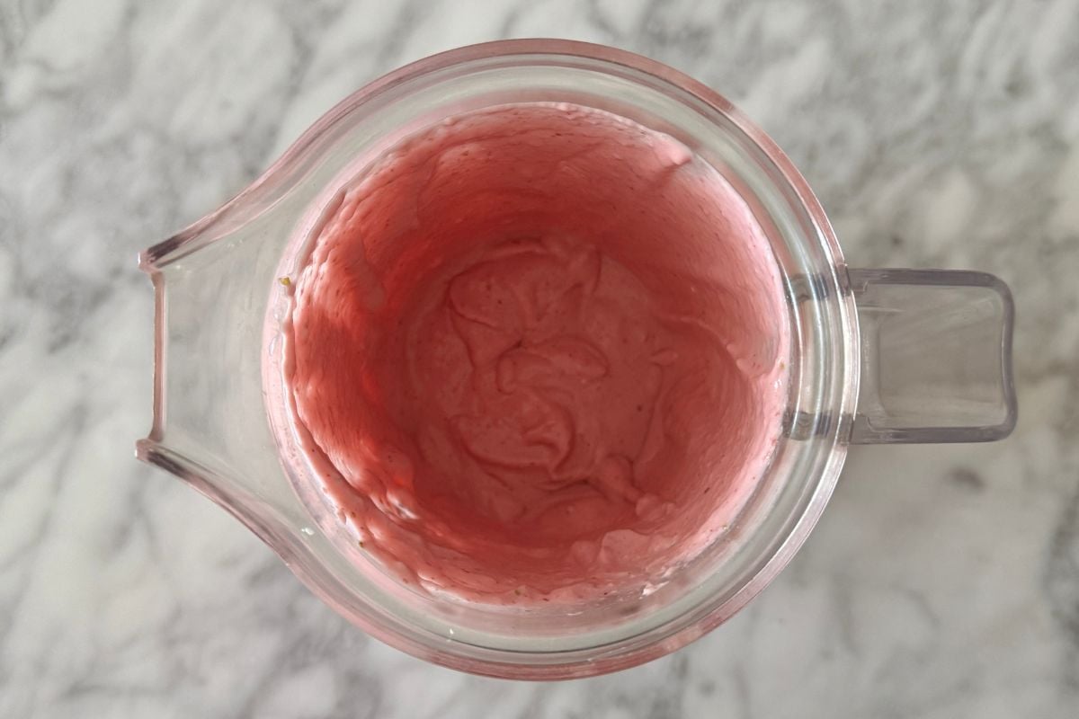 Blended strawberry mousse in a blender