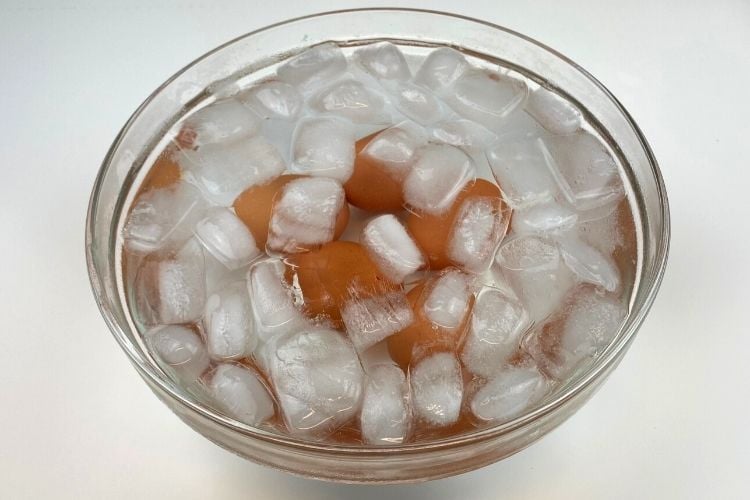 Boiled eggs in ice bath