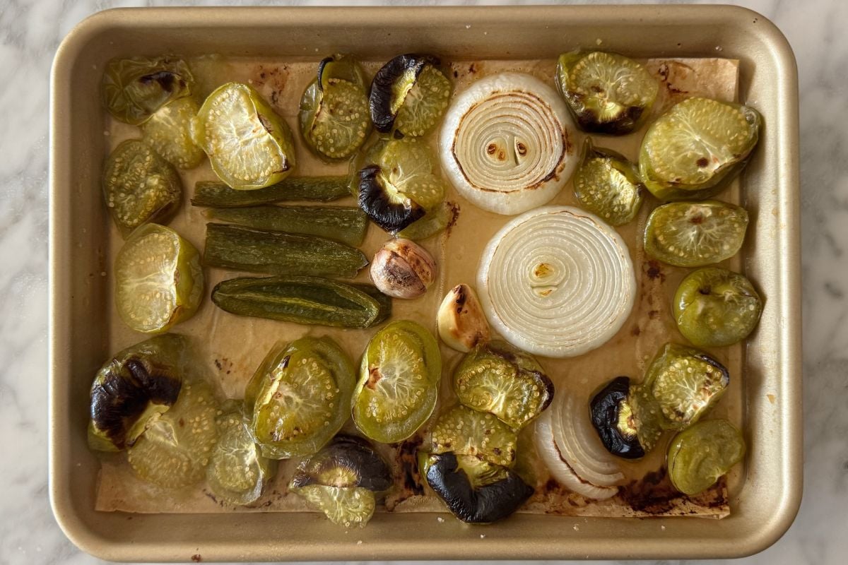 Broiled tomatillos on baking sheet