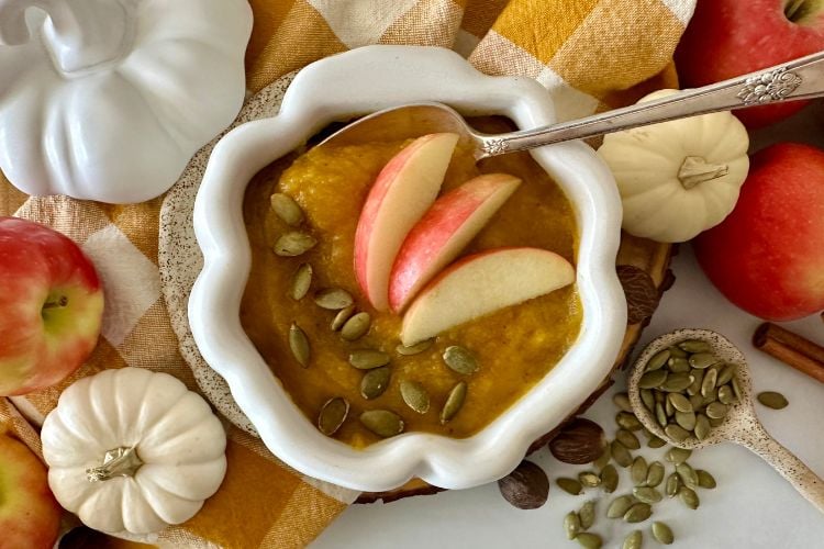 Butternut squash and apple soup in bowl