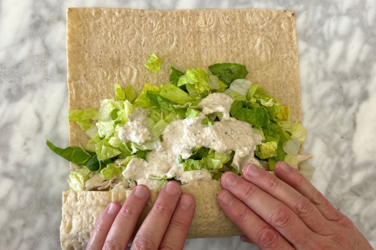 Caesar dressing on chicken Caesar wrap