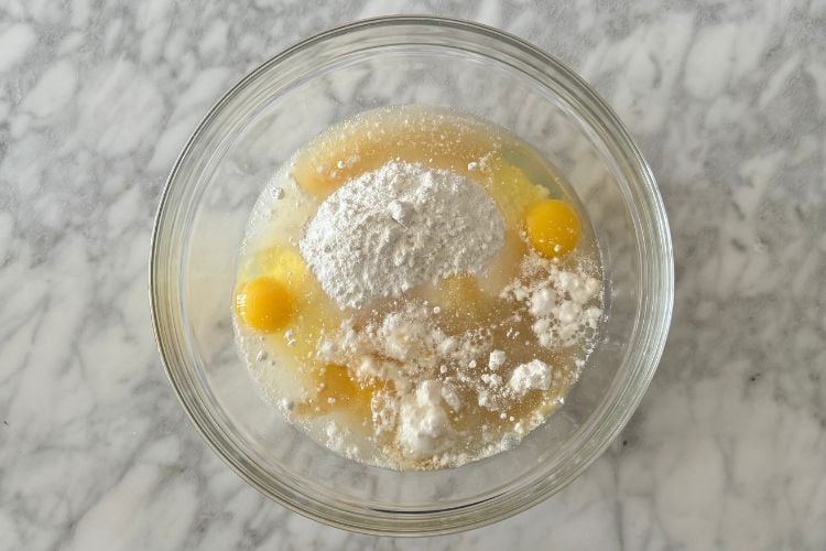 Cake mix ingredients in bowl