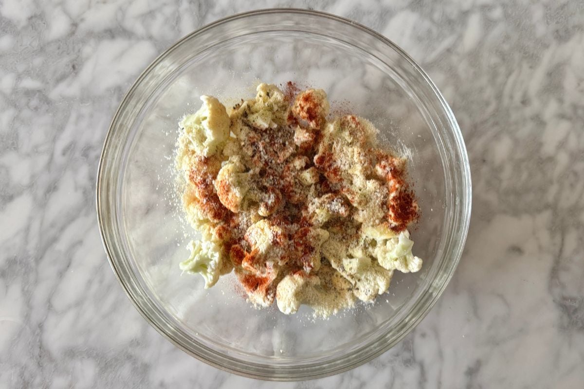 Cauliflower florets in large bowl