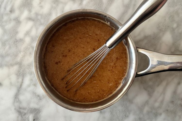 Chai latte in saucepan