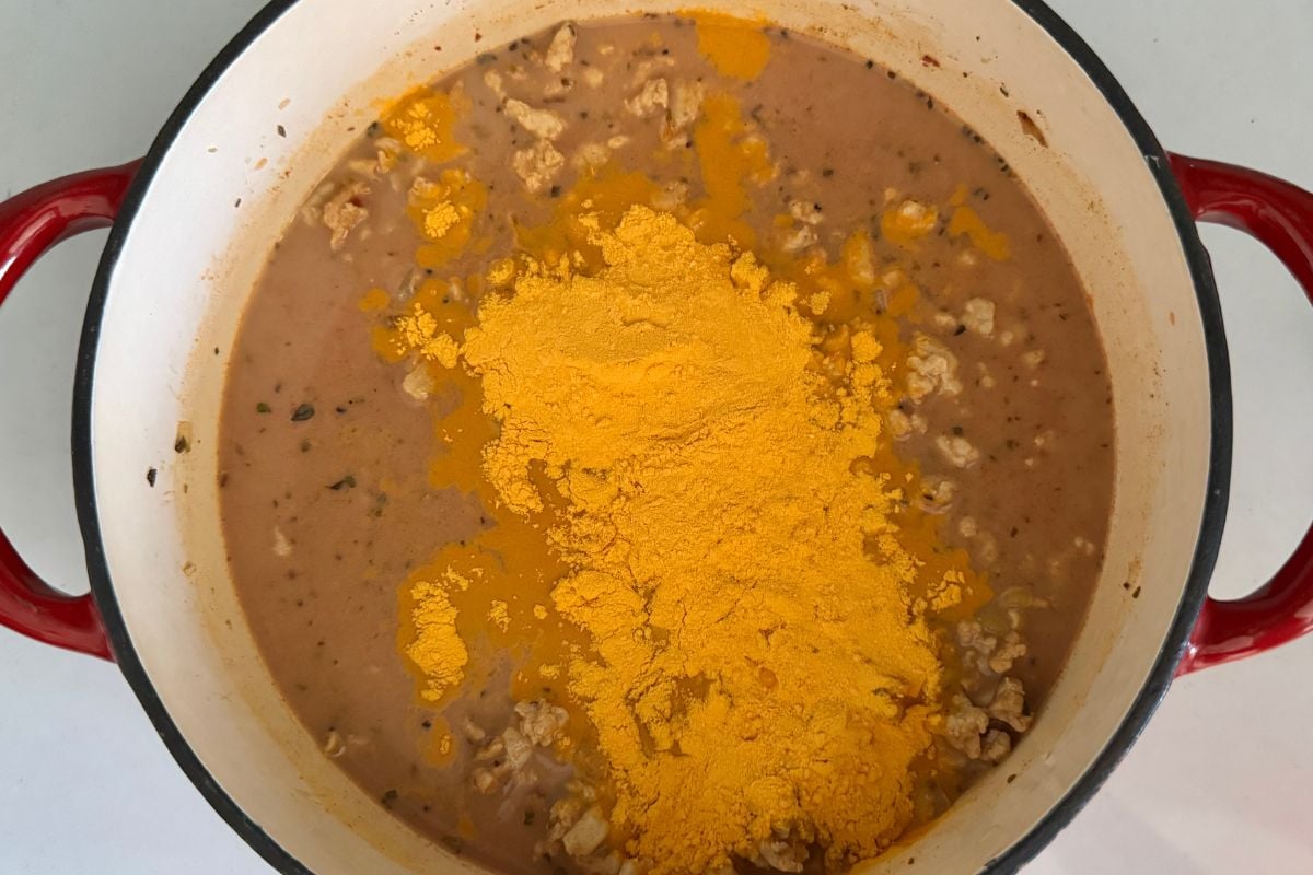 Cheddar cheese powder in the pot