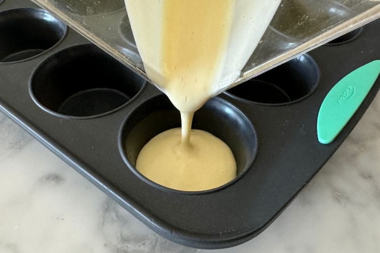 Cheesecake batter in muffin pan