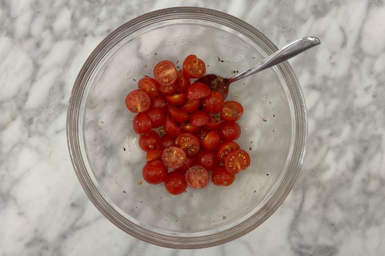 Cherry tomatoes mixed in seasonings