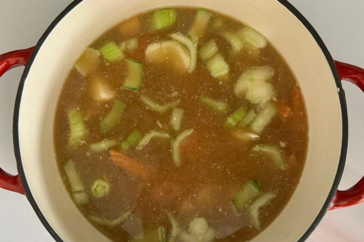 Chicken broth in Dutch oven