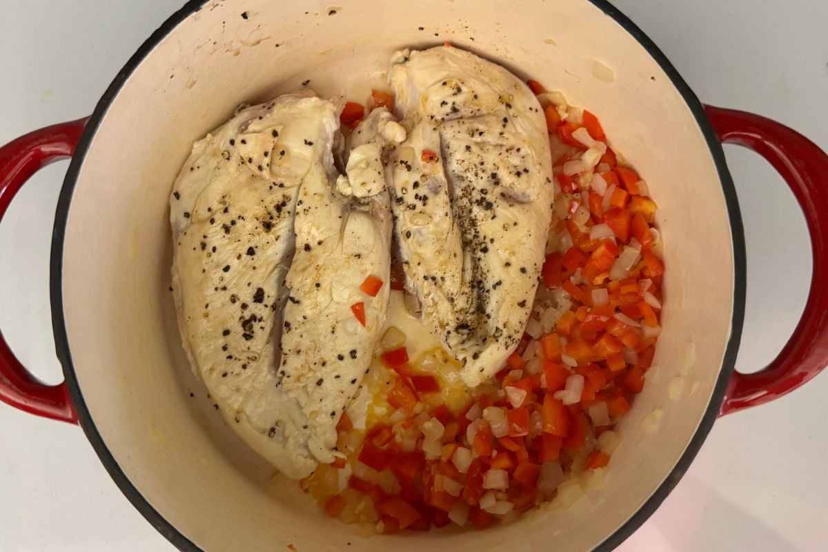 Chicken in Dutch oven for corn chowder