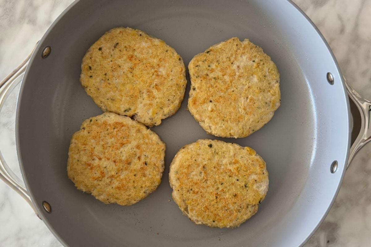 Chicken parmesan patties in pan