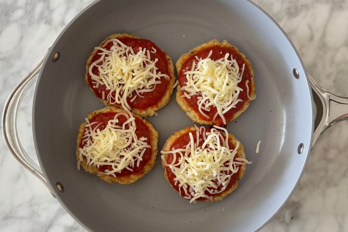 Chicken patties topped with marinara and cheese