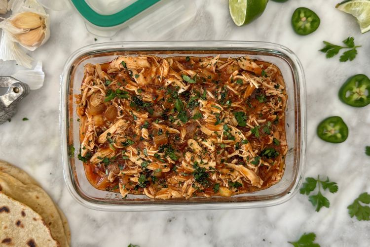 Chicken tinga in a storage container