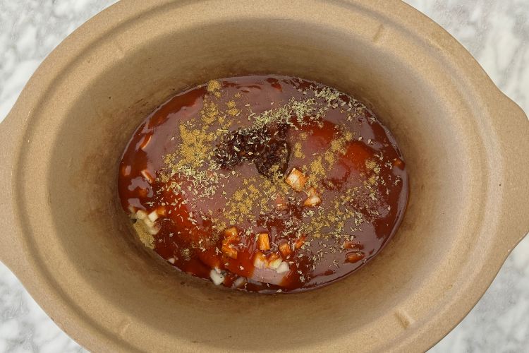 Chicken tinga ingredients in slow cooker