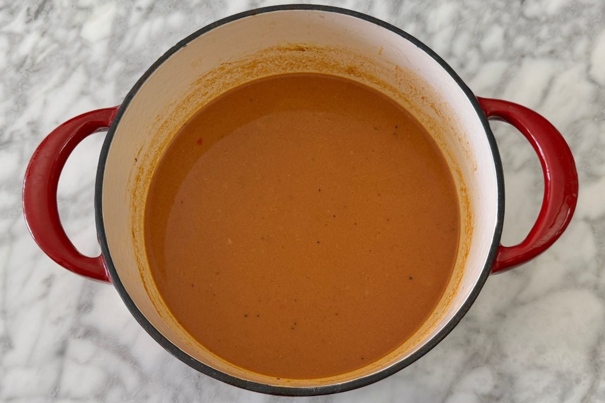 Chickpea curry ingredients in Dutch oven