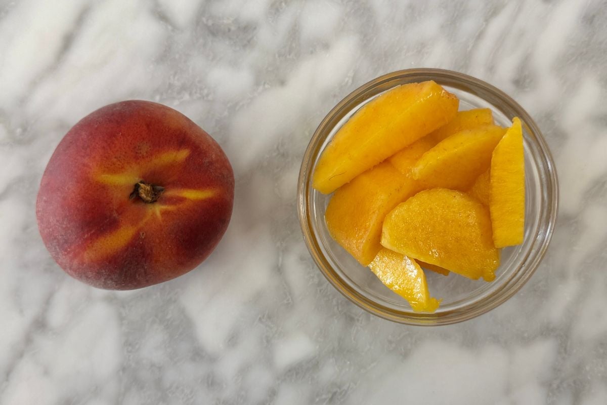 Chopped fresh peach in bowl