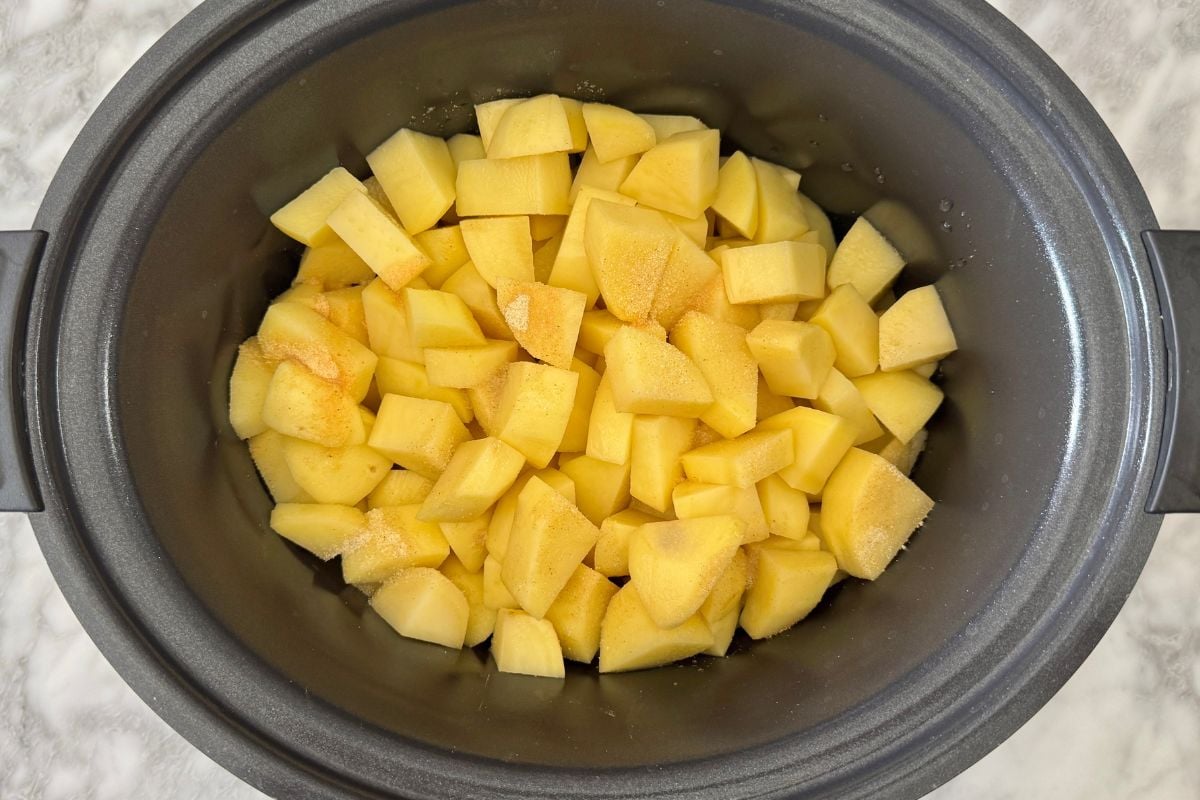 Chopped potatoes in the slow cooker