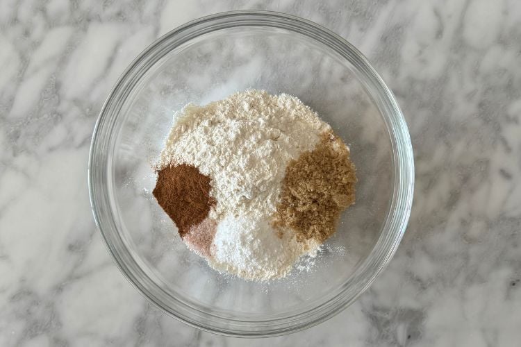 Cinnamon raisin bagel dough ingredients in bowl