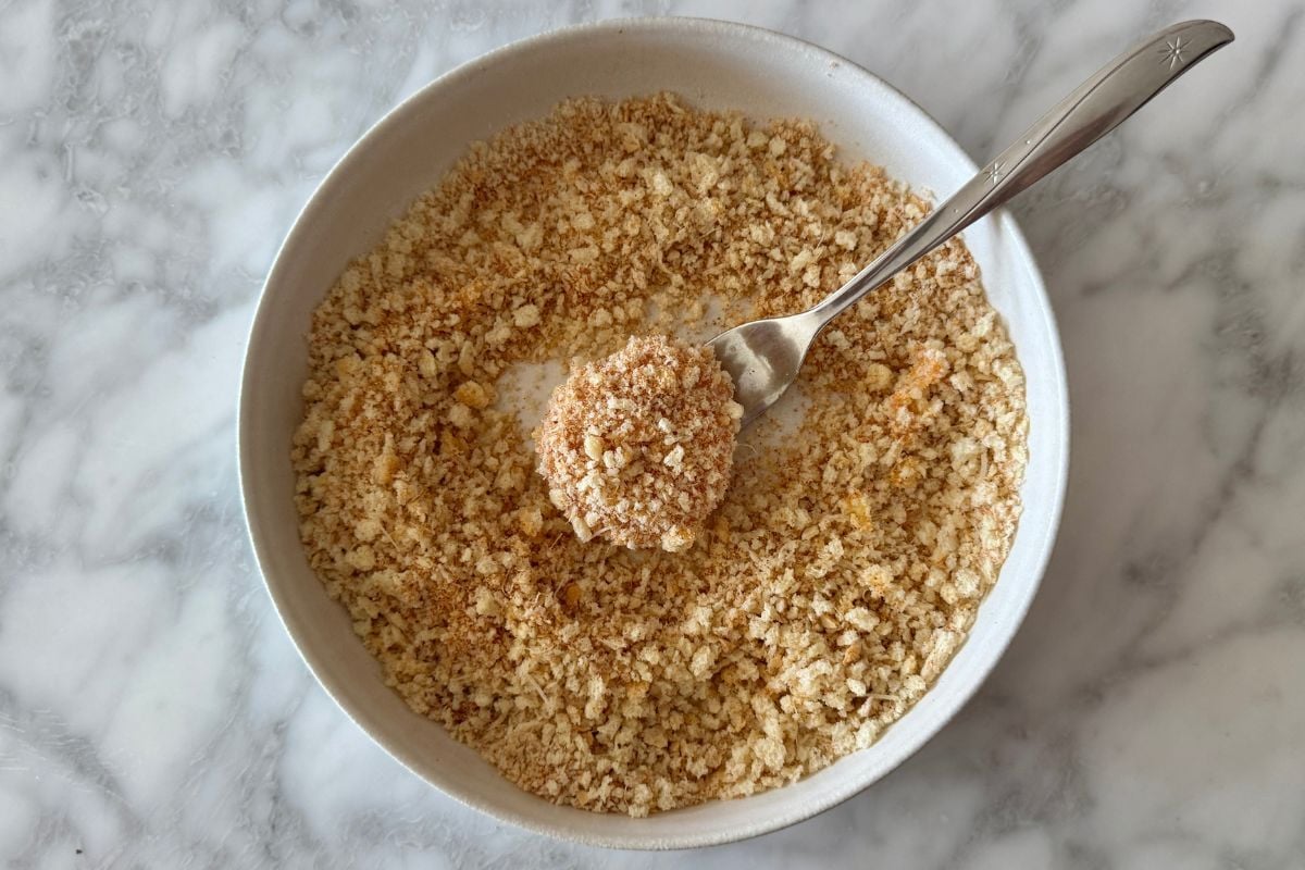 Coated chicken nugget in breadcrumb mixture