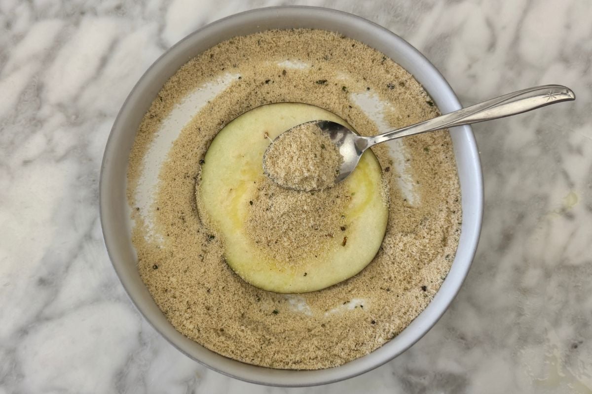 Coated sliced eggplant in breadcrumbs