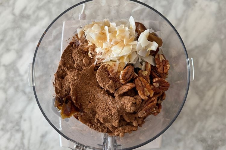 Coconut date balls ingredients in food processor
