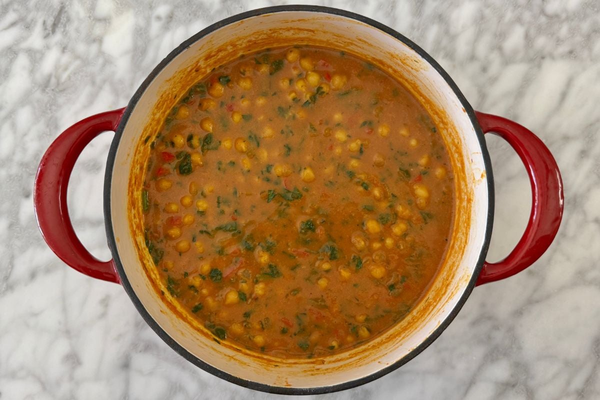 Combined coconut chickpea curry in Dutch oven