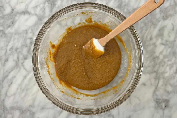 Combined gingerbread muffin batter in bowl
