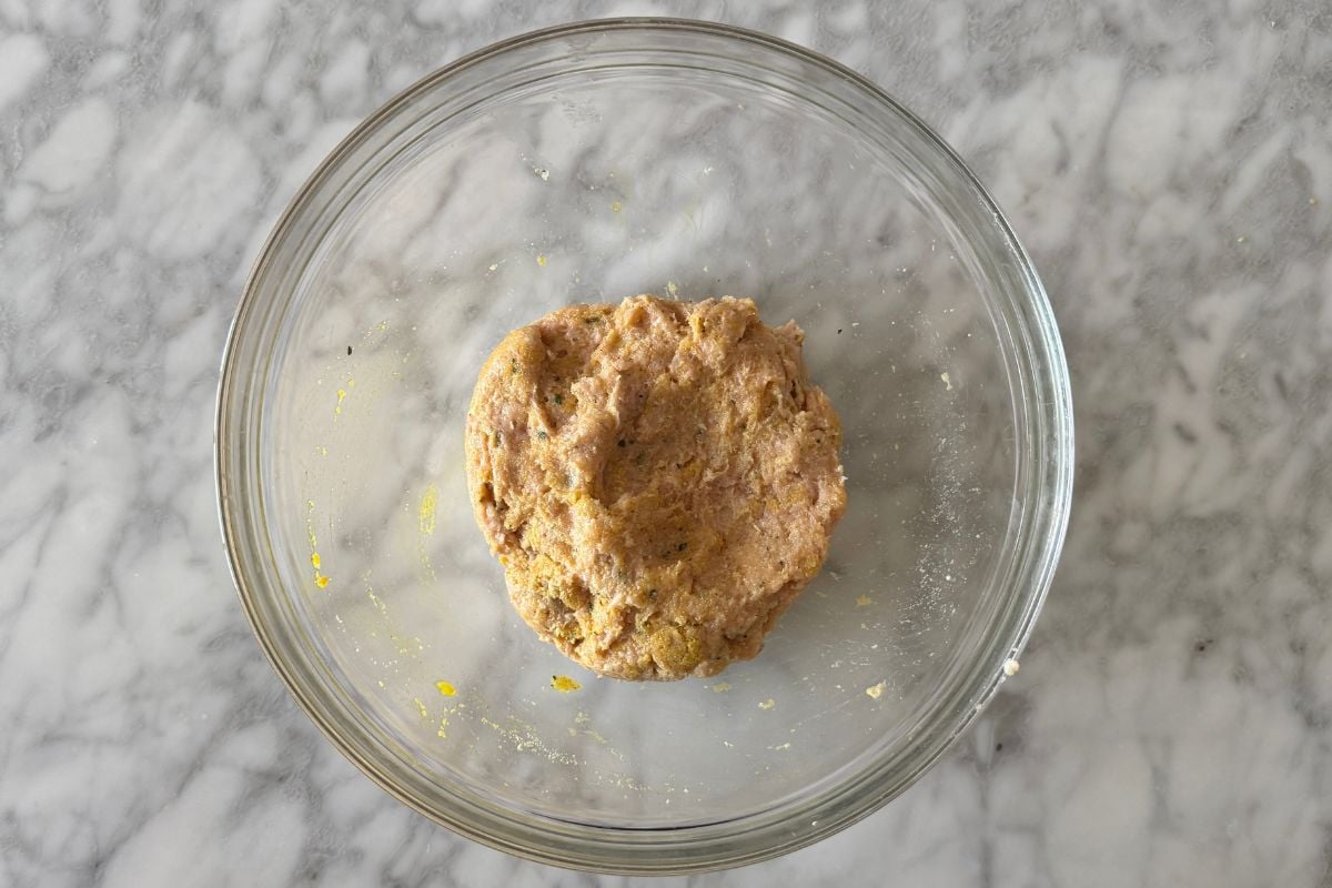 Combined ground chicken parmesan burgers mixture