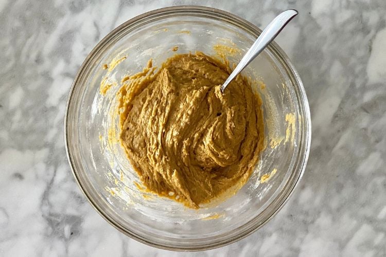 Combined ingredients for pumpkin cookies