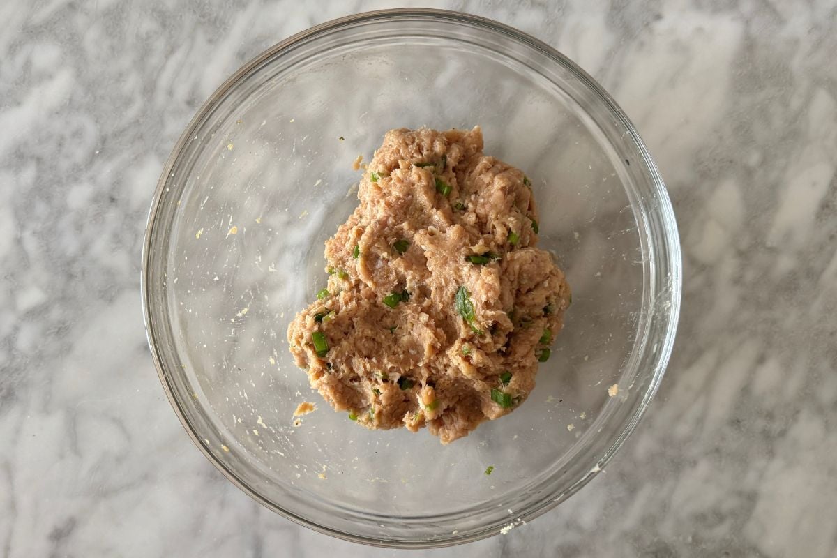Combined teriyaki meatballs mixture in bowl