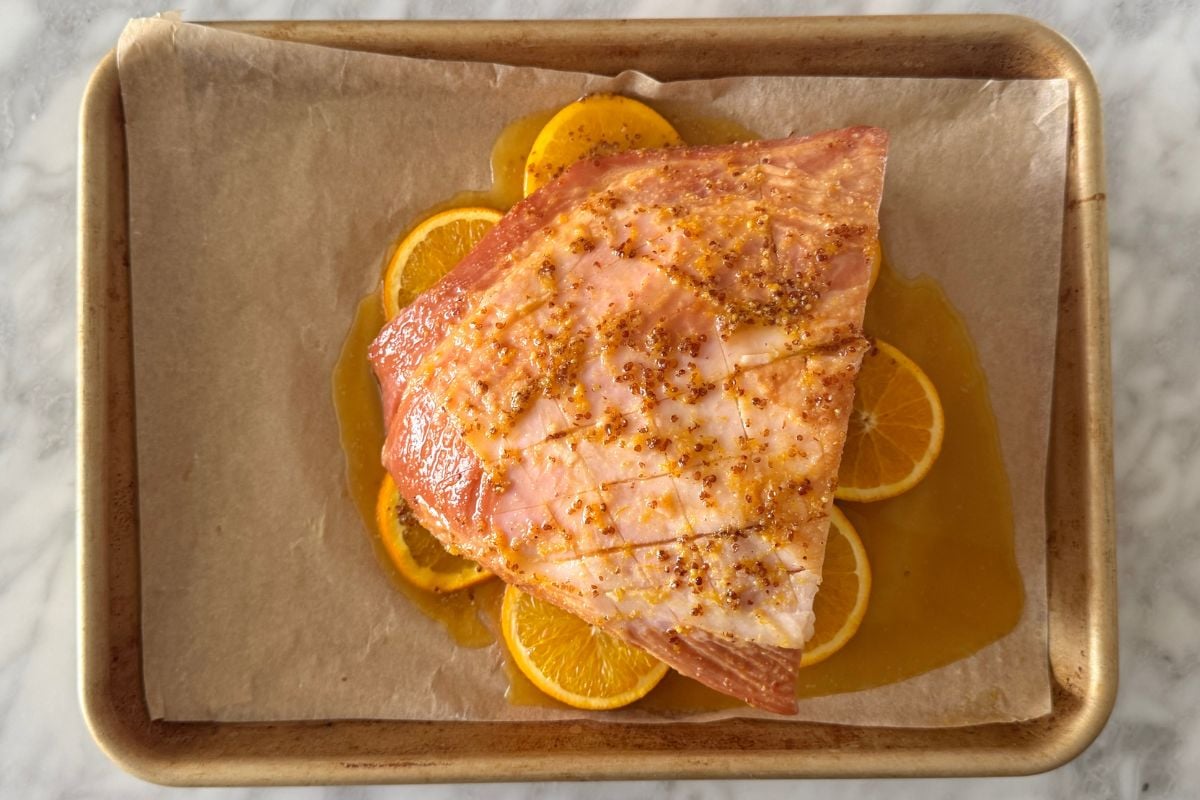 Cooked carver ham with honey and orange glaze