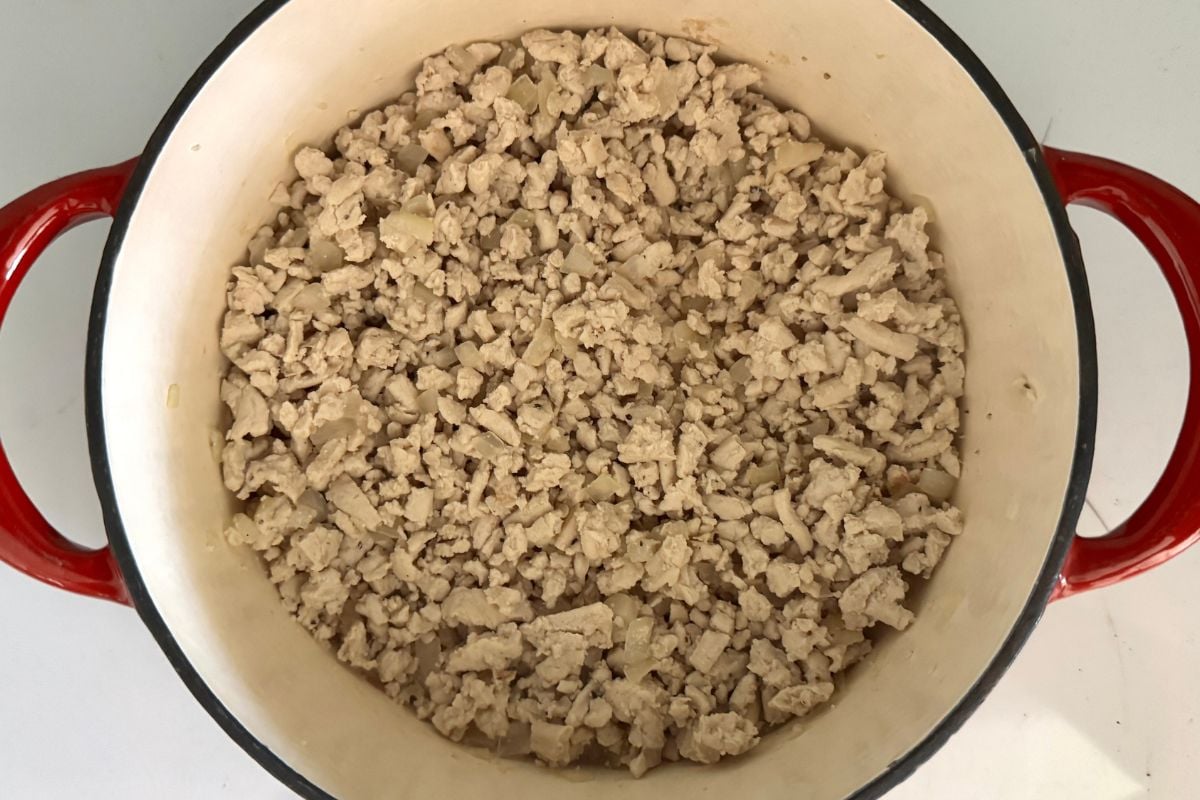 Cooked ground turkey and onion in a pot