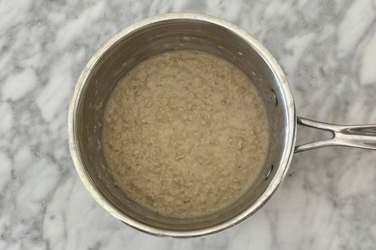 Cooked oatmeal in saucepan