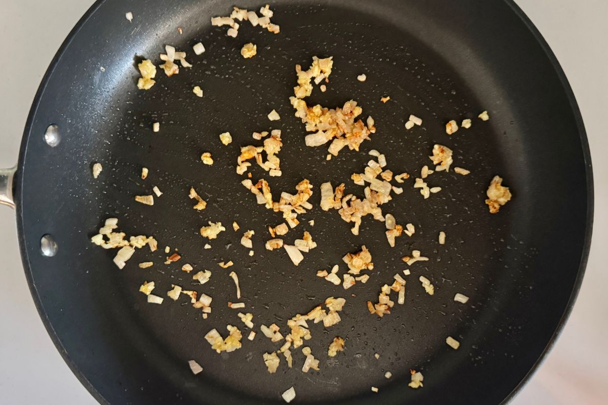Cooked shallot and garlic in skillet