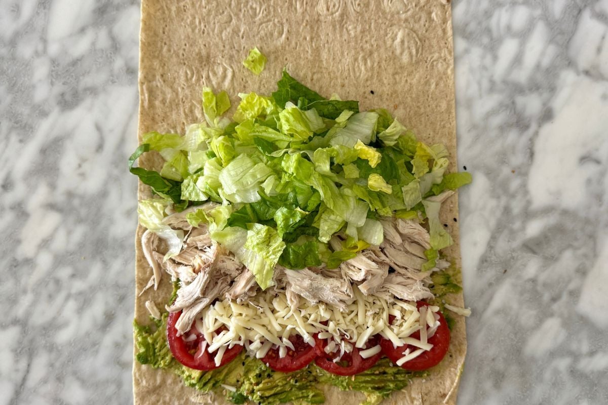 Cooked shredded chicken in the wrap