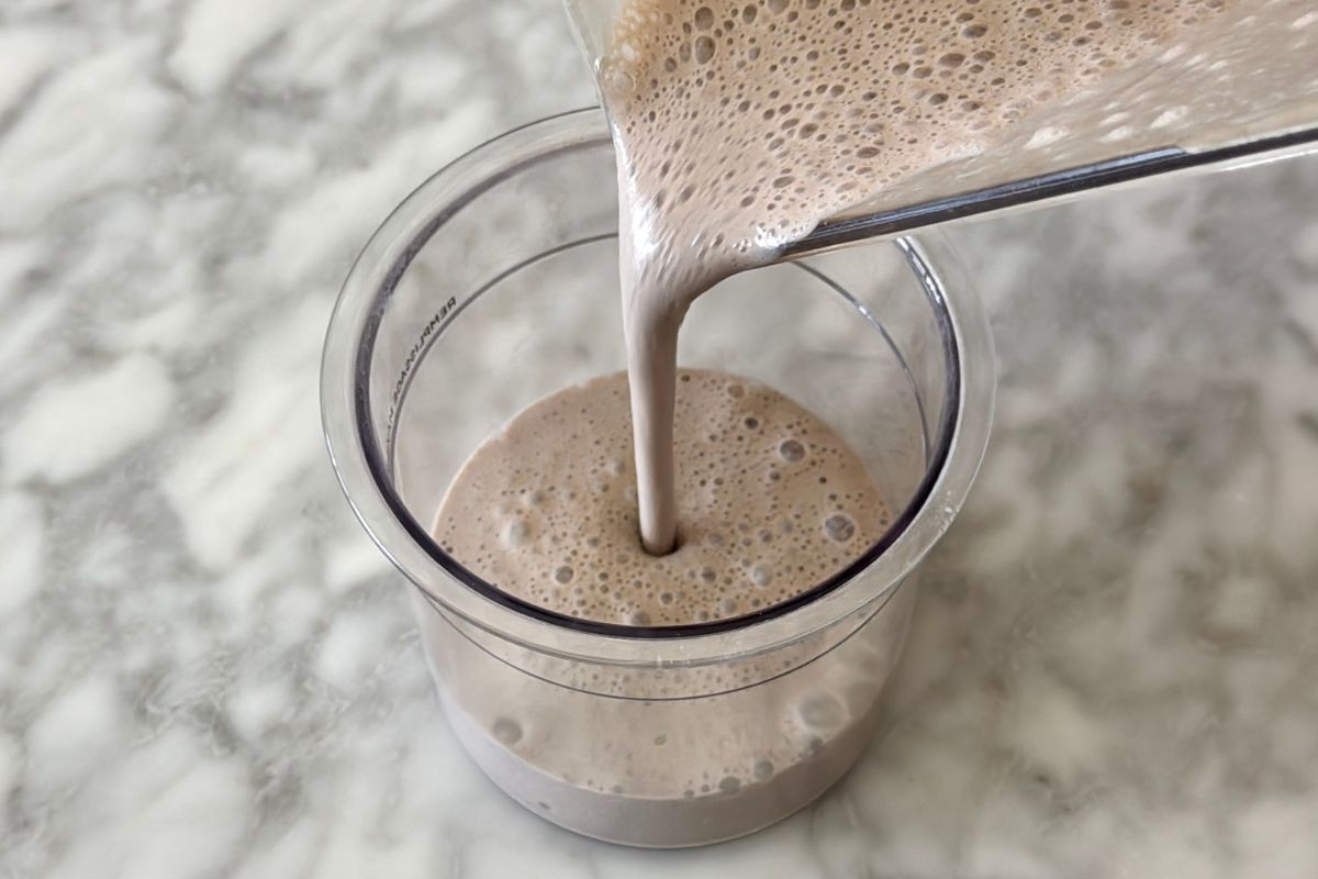 Cookies and cream protein ice cream mixture in pint container