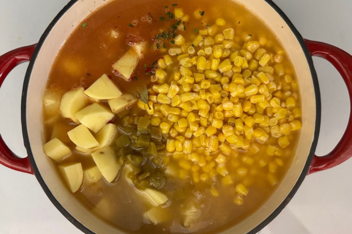 Corn and potatoes in Dutch oven for chowder