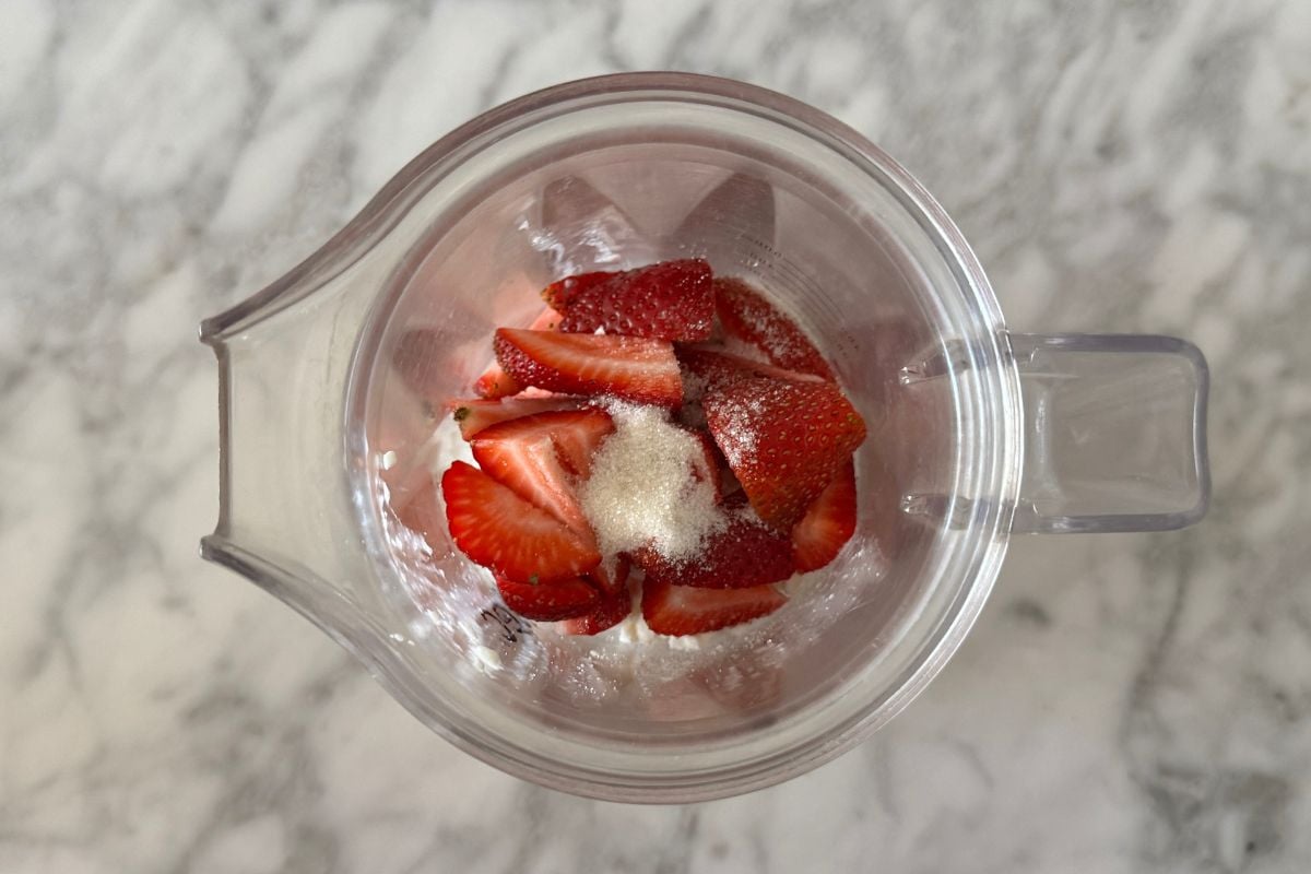 Cottage cheese and strawberries in a blender