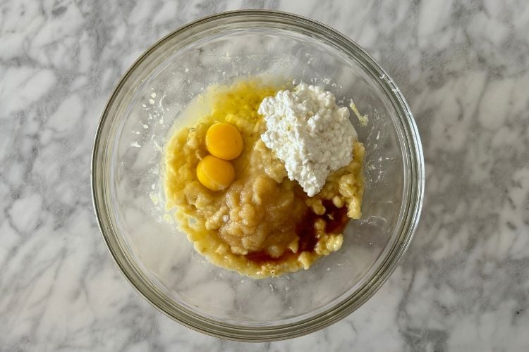 Cottage cheese banana bread wet ingredients in bowl